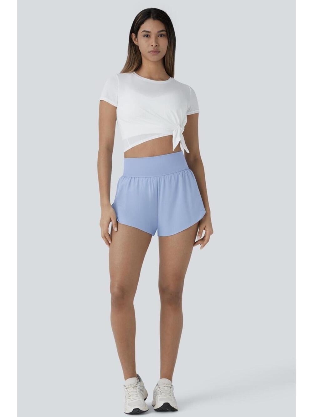 Halara High-Waisted Light Blue Running Shorts with Built-In Shorts and Pockets